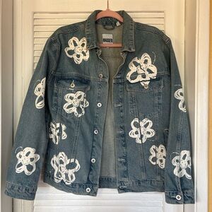Ragged Blue Denim Jacket with White Floral Accents